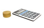 Free Stock Photo: A calculator and a stack of gold coins