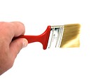 Free Stock Photo: A hand holding a paint brush isolated on a white background
