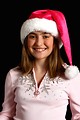 Free Stock Photo: A beautiful young girl posing in a pink santa hat