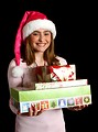 Free Stock Photo: A beautiful young girl in a pink santa hat holding presents