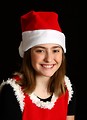 Free Stock Photo: A cute young girl posing in a Santa hat