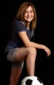Free Stock Photo: A cute young girl posing with a soccer ball