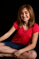 Free Stock Photo: A cute young girl posing on a black background