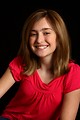 Free Stock Photo: A cute young girl posing on a black background