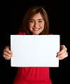 Free Stock Photo: A cute young girl holding a blank sign