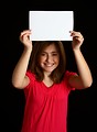 Free Stock Photo: A cute young girl holding a blank sign