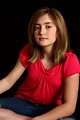 Free Stock Photo: A cute young girl posing on a black background