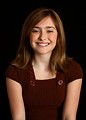 Free Stock Photo: Close-up portrait of a cute young girl posing before a black background