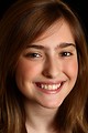 Free Stock Photo: Close-up portrait of a cute young girl posing before a black background
