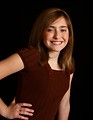 Free Stock Photo: Close-up portrait of a cute young girl posing before a black background