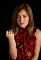Free Stock Photo: A cute young girl looking angry and making a fist