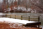 Free Stock Photo: A snow covered dock by a lake