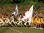 Free Stock Photo: A middle school football team taking to the field
