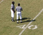 Free Stock Photo: Football referees on a field