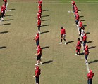 Free Stock Photo: Football players exercising on a field