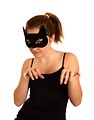 Free Stock Photo: A pretty young girl dressed in a black cat mask