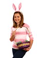 Free Stock Photo: A cute young girl dressed in a bunny costume with an Easter basket