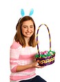 Free Stock Photo: A cute young girl dressed in bunny ears holding an Easter basket