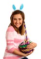 Free Stock Photo: A cute young girl dressed in bunny ears holding an Easter basket