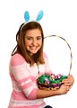 Free Stock Photo: A cute young girl dressed in bunny ears holding an Easter basket