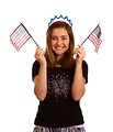 Free Stock Photo: A cute young girl dressed up for the 4th of July holding small American flags