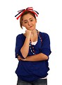 Free Stock Photo: A cute young girl dressed up for the 4th of July with a thoughtful expression.