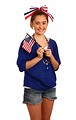 Free Stock Photo: A cute young girl dressed up for the 4th of July holding a small American flag