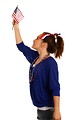 Free Stock Photo: A cute young girl dressed up for the 4th of July holding a small American flag