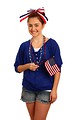Free Stock Photo: A cute young girl dressed up for the 4th of July holding a small American flag