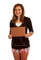 Free Stock Photo: A cute young girl posing with a blank brown sign