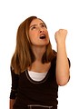 Free Stock Photo: A cute young girl posing with an angry expression making a fist