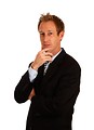 Free Stock Photo: A young businessman in a suit isolated on a white background