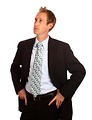 Free Stock Photo: A young businessman in a suit isolated on a white background