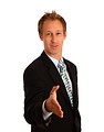 Free Stock Photo: A young businessman extending his hand for a handshake