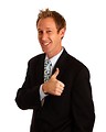 Free Stock Photo: A young businessman giving a thumbs up signal with his hands