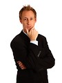 Free Stock Photo: A young businessman in a suit isolated on a white background