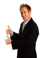 Free Stock Photo: A young businessman giving a thumbs up signal with his hands