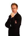 Free Stock Photo: A young businessman in a suit isolated on a white background.