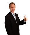 Free Stock Photo: A young businessman giving a thumbs up signal