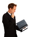 Free Stock Photo: A young businessman holding a tablet computer