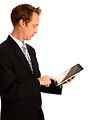 Free Stock Photo: A young businessman holding a tablet computer