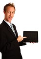 Free Stock Photo: A young businessman holding a tablet computer