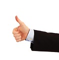 Free Stock Photo: A young businessman making a thumbs up gesture