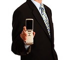 Free Stock Photo: A young businessman holding a cell phone.