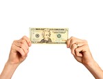 Free Stock Photo: Hands holding up a twenty dollar bill