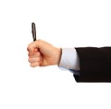 Free Stock Photo: A hand holding a pen isolated on a white background
