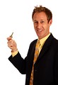 Free Stock Photo: A young businessman in a suit holding a key