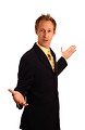 Free Stock Photo: A young businessman in a suit and tie isolated on a white background