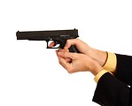 Free Stock Photo: A hand in a business suit holding a pistol