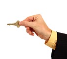 Free Stock Photo: A hand in a business suit holding a key